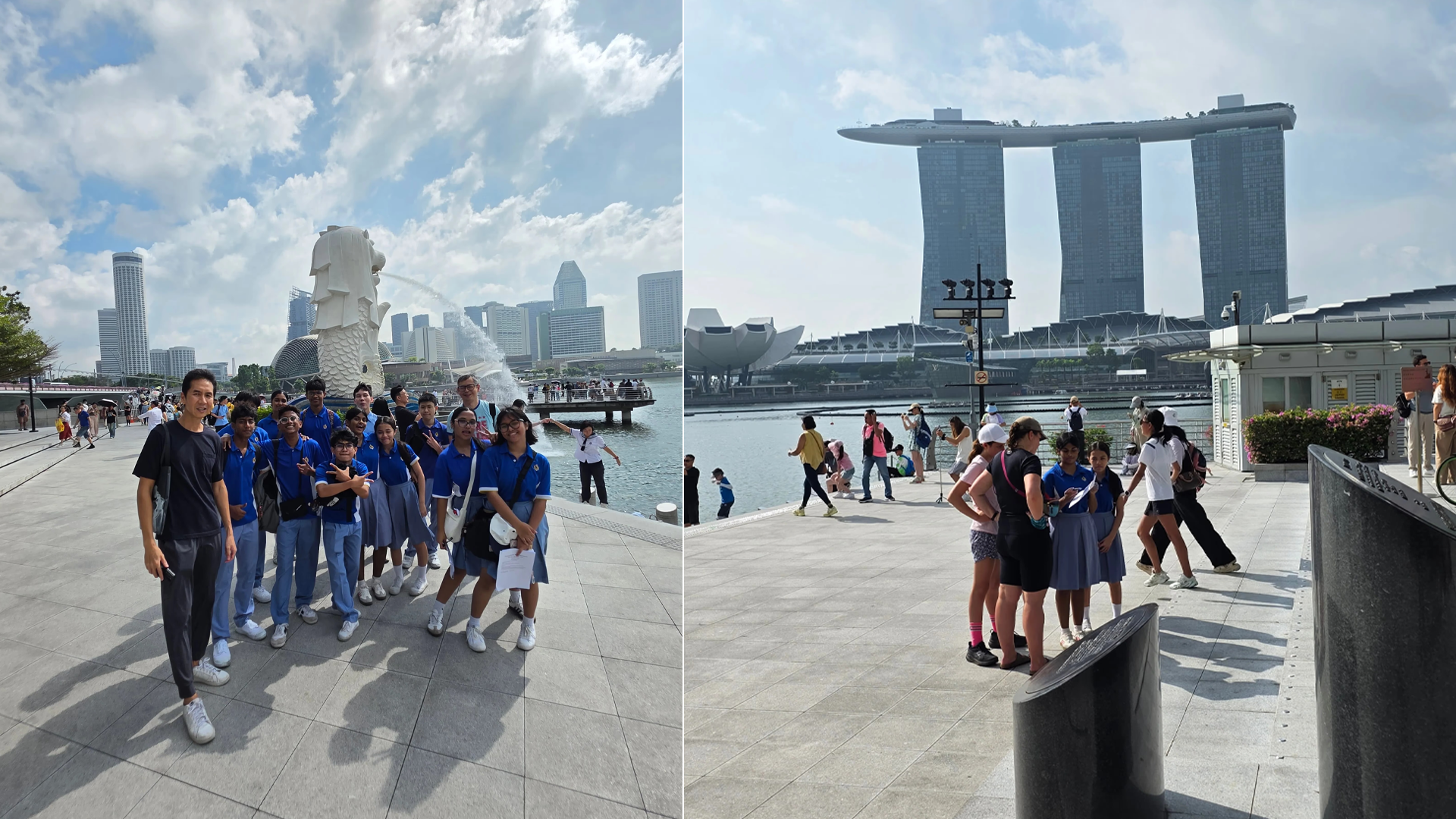 Group of students in blue uniforms posing by Merlion statue spraying water, with city skyline behind &